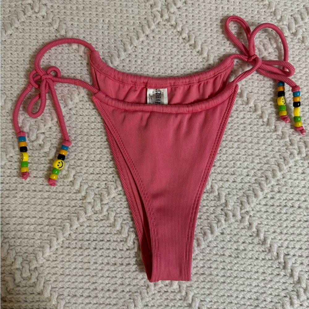 medium Forever 21 pink bikini bottoms with beads